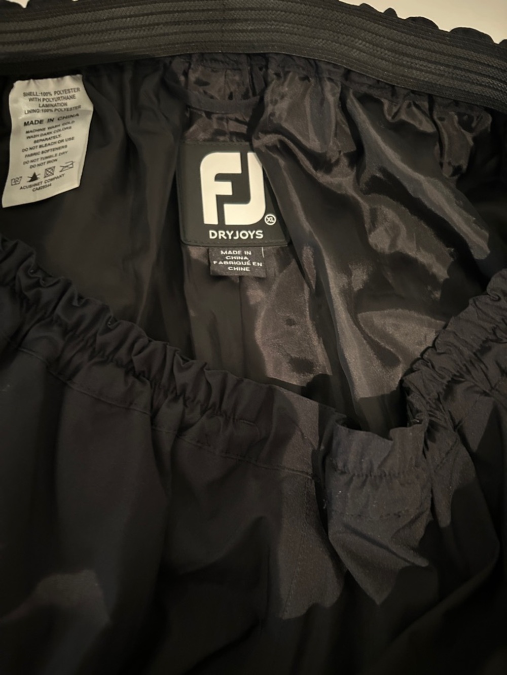 NWOT FootJoy DryJoys Black Golf Rain Pants, size XL.